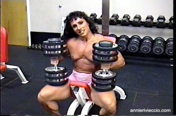 Annie Rivieccio, muscular, female bodybuilder, punching bag, gym workout, pecs, squats, muscular legs