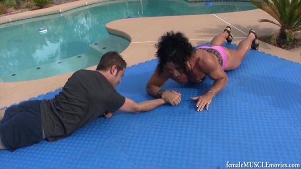 Annie Rivieccio, muscular, female bodybuilder, boy toy, arm wrestle, mixed wrestle