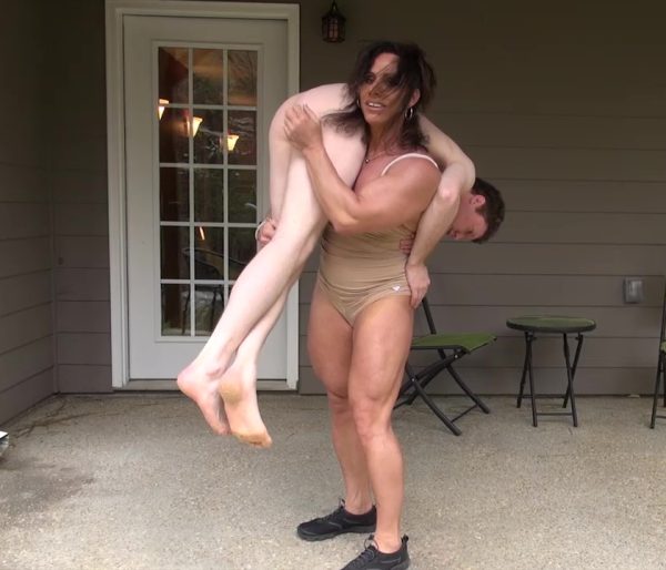 female muscle movies, femalemusclemovies, femalemusclemoviesvod, Annie Rivieccio, muscular, female bodybuilder, lift and carry, workout, muscle worship, muscular arms, smaller man, nude